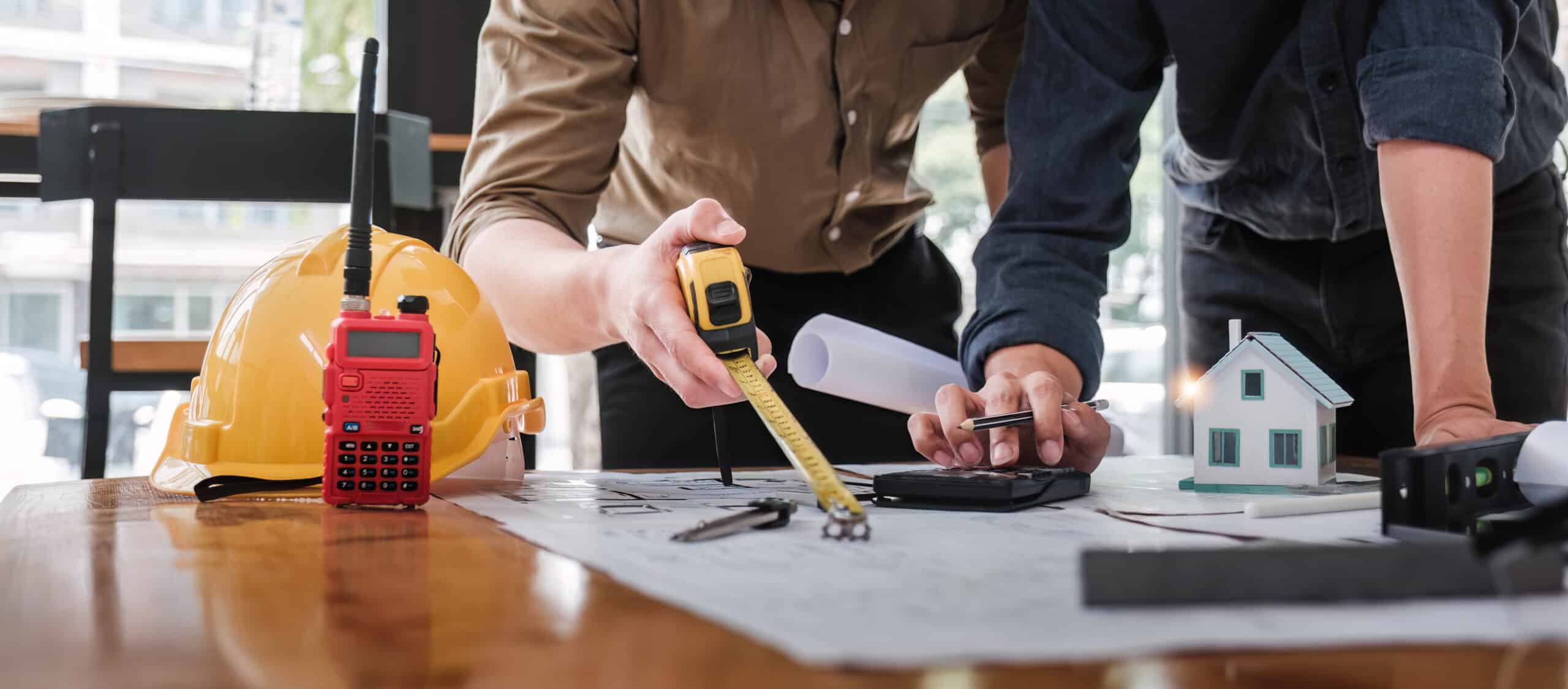 Maintenance and construction team coordinating on a property project