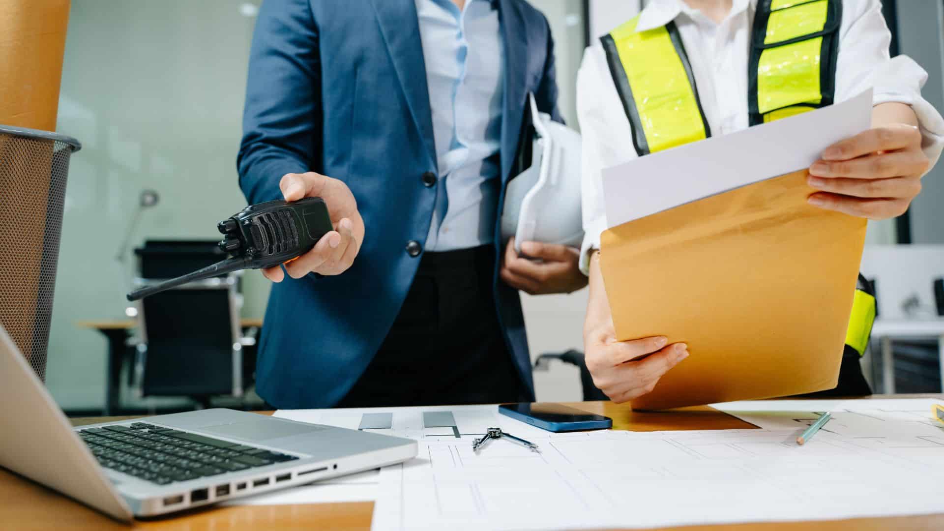 Property manager reviewing safety and compliance documents